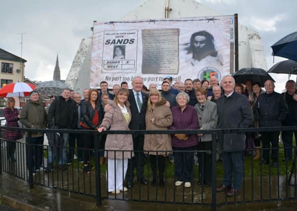 Large group pictured at the unveiling of the billboard designed to commemorate the 35th anniversary of Bobby Sands election to parliament at Free Derry Wall at the weekend.
