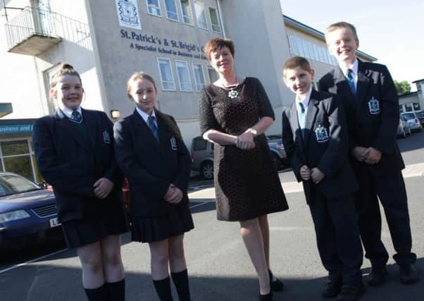 Deirdre O'Kane, principal, pictured with some of the pupils of St. Patrick's and St. Brigid's, Claudy