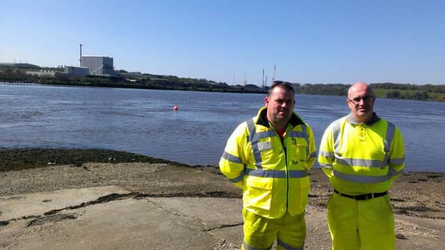 Local heroes: Transport NI/ DRD workers Raymond Shields and Darren McGrellis at the Culmore Point slipway.