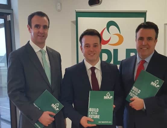 SDLP Foyle Assembly candidates Mark H Durkan, party leader Colum Eastwood and Gerard Diver.