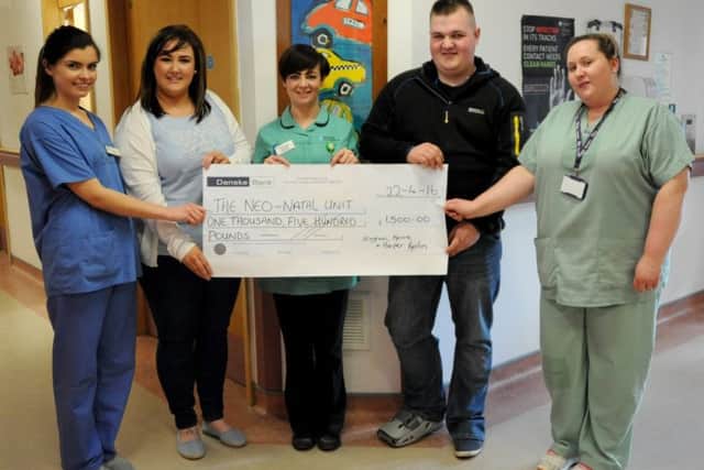 The Neo Natal Intensive Care Unit in Altnagelvin has received a generous donation of Â£1,500 from Kerrie and Eoghan Kerlin. Pictured are Mary ONeill, Lorraine Denney and Samantha McNeill accepting the cheque on behalf of the Unit.