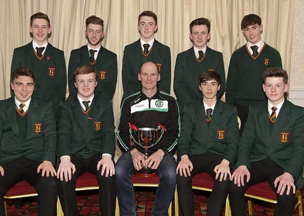 Faughanvale manager Paul Bradley pictured with the players who were members of the  St Mary's Limavady U19 squad and who were the 2016 Ulster Gaelic Champions. INLV1716-124KDR