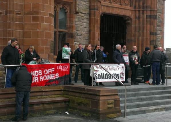Residents took part in a protest in February over the transfer proposals.