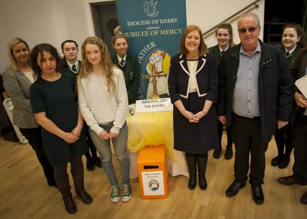 WEEK OF MERCY. . . .Group pictured at St. Cecilia's College on Wednesday morning for the 'Week of Mercy' celebrations. Included from left are Jennifer O'Kane, Diana Curran, Aimee McDermott, Kila Curran, speaker, Caitlin McCann, Mrs. Martine Mulhern, Principal, Niamh Nash, Richard Moore, speaker, Emma Hutton and Paul McFadden. DER1516MC006