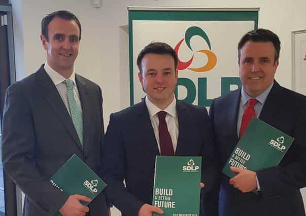 The three SDLP candidates for Foyle in the forthcoming Assembly election: From left to right. Minister for the Environment, Mark H Durkan, SDLP leader Colum Eastwood and outgoing MLA Gerard Diver.