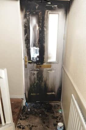 A PSNI photo of the damage caused by the arson attack inside the flat at Kennaught Terrace.