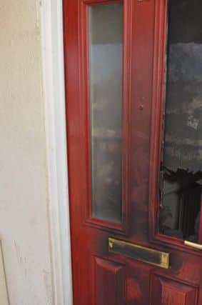 The front door of the flat targeted in the arson attack. Photo: PSNI