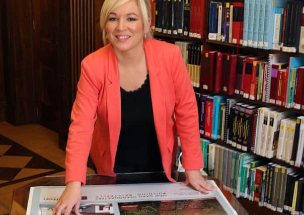 Agriculture Minister Michelle O'Neill looking over plans for the new headquarters for DARD in Ballykelly.