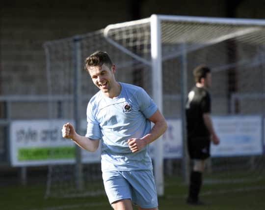 Shane McGinty celebrates after opening the score for Institute during SaturdayÃ¢Â¬"s match against Lisburn Distillery. INLS1016-123KM