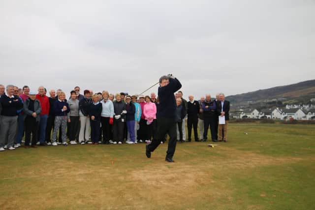 North-West Captain, Mr. Gerard Callaghan, officially opens the new golf season at the club's traditional Drive-In at Lisfannon.