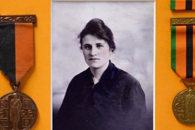 Elizabeth (Lizzie) Doherty from Waterloo Street in Derry was a member of Cumann na mBan. The medals on either side were awarded to her on the 50th anniversary.