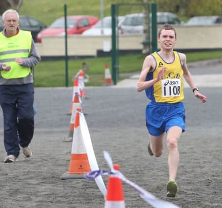 Derry City Track Club's Conan McCaughey won bronze at the  NI & Ulster 5K road championships at the Queens 5K.