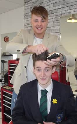 Kavin with Jordan preparing for the big shave off.