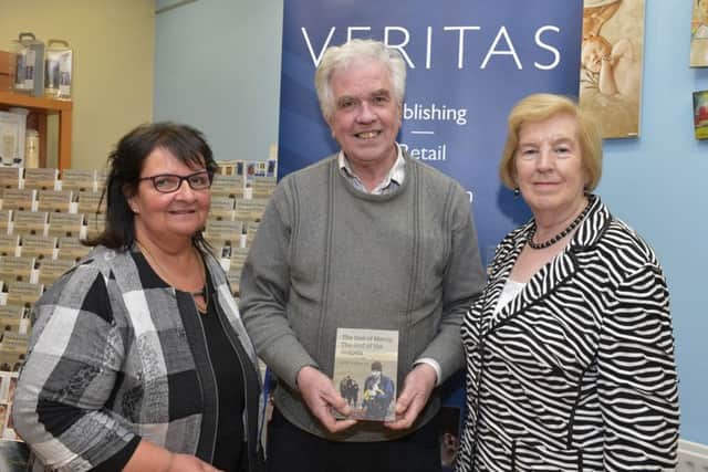 Dublin based Jesuit priest Father Peter McVerry SJ pictured at the launch of his new book The God of Mercy, The God of the Gospels in the Veritas Bookshop Derry on Thursday evening last with shop manager Lucy Gillespie (left) and Veritas director Maura Hyland. DER1616GS031