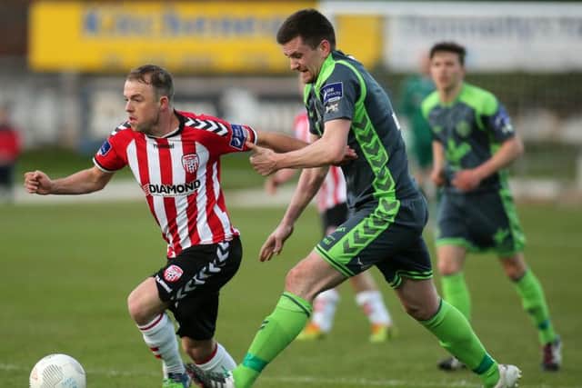Â©/Presseye.com - 22nd April 2016.  Press Eye Ltd - Northern Ireland - Airtricity League Premier Division - Derry City V Bohemians

Derry's Keith Ward and Bohemian's Dave Mulcahy.

Mandatory Credit Photo Lorcan Doherty / Presseye.com
