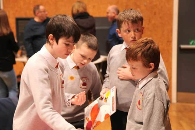 Children from Fountain PS discuss their plans at the Centenary {con} Fusion event.