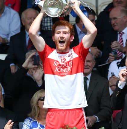 Derry captain, Conor Glass, lifts the Ulster Minor Championship trophy last July in Clones. (
Picture by Andrew Paton / PressEye)