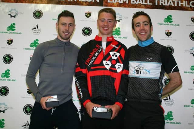 PODIUM 2015 . . . Liam Ball Sprint Triathlon 2015 winner James Walton (Triangle Triathlon Club) in centre with, left, Derry triathlete Daniel Quigley in third and Bernard McCullagh (Go Tri) in second. Photo courtesy of Peter McLaughlin.