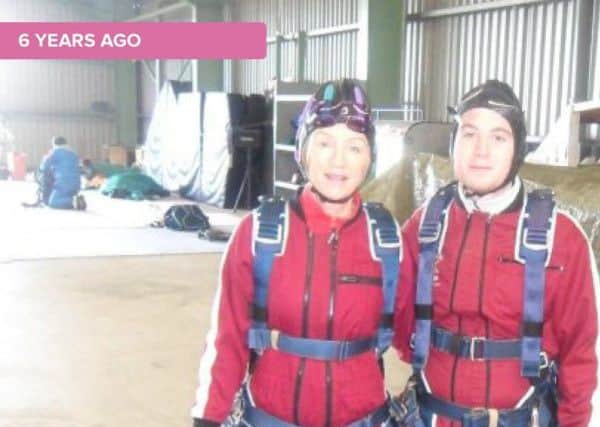 Maire and son Tom prepare for their skydive in 2010.