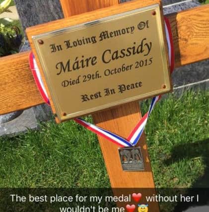 Eibhlin left her swimathon medal on  her mums grave.