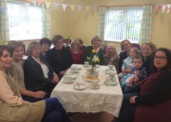Residents of Gortnaghey, including Eithne Burke from Gortnaghey Community Centre, with residents at a community event on Sunday.