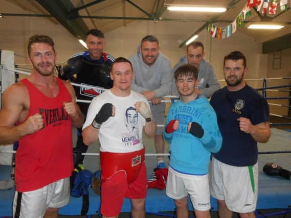 Oakleaf ABC coaches and some of the Oakleaf ABC boxers who will feature in the Odhran McKinney Memorial tournament at the Maldron Hotel this Friday night.