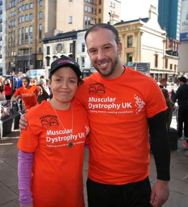 Louise James pictured with hero Davitt Walsh after the marathon on Monday. 
Photograph By Declan Roughan