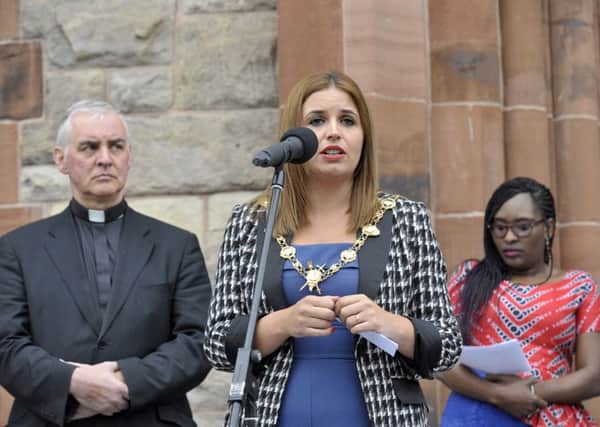 The Mayor of Derry and Strabane Councillor Elisha McCallion speaking at a solidarity vigil held in Guildhall Square supporting refugees fleeing conflict. DERR3615GS04