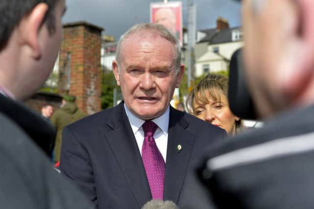 Martin McGuinness, Deputy First Minister speaking to the media outside the Model School Polling Station on Academy Road. DER1816GS056