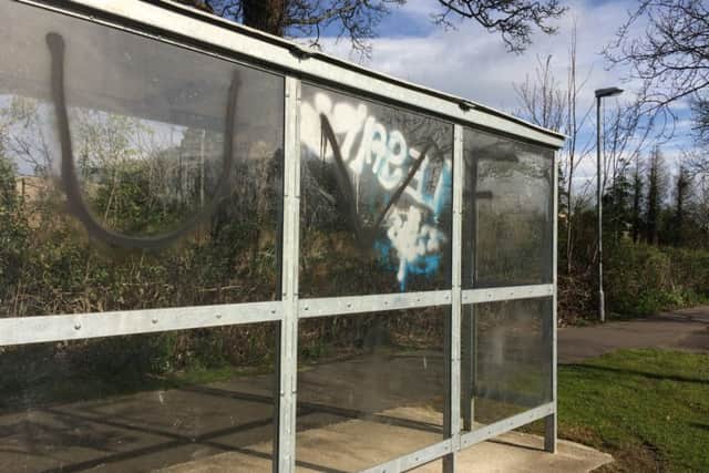 Graffiti daubed on the bus shelter in Burnfoot, outside Dungiven.