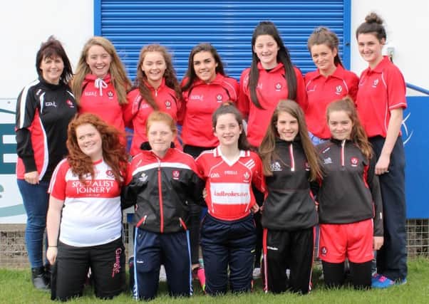Members of Limavady Wolfhounds GAC who have represented the County over the past two years at U14, U16 and minor level. Back row: Ann Hassan (Wolfhounds Ladies Representative) Molly Canning U16, Saoirse Hassan U16, Anna Bonner U16, Leonie McIlroy U16, Toireasa Mc Ilroy Minors and Niam Mc Ilroy U16.  Front row: Nuala Cooke  U14, Faye Young U14, Meghan Mc Ilroy U14, Erin Bradley U14 and Jodie Canning U14 (Missing from photo are U14 players Kate Dallas and Aimee Mc Cawville, minor player Kelly Logue and senior player Cara Farren ... PHOTO Tracy Hartin.