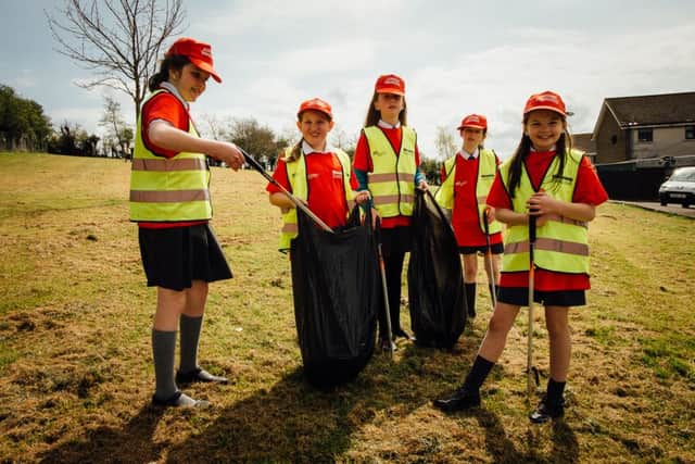 Junior wardens from New Buildings PS taking part in a clean-up in their local area.