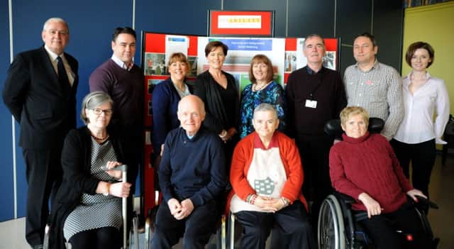 Back row (L-R): Cathal McElhatton, Foyle Disability Resource Centre Manager; Shane McCarney, Acquired Brain Injury Team Consultant Psychologist; Patricia Doherty, Care Assistant; Kitty Downey, Acting Head of Service Southern Sector; Angela O' Donnell, Community Brain Injury Team Social Worker; Kevin Murray, Senior Day Care Worker; Paul McCaffrey, Foyle Disability Resource Centre Administrator and Deborah McCrory, Acquired Brain Injury Researcher.
Front row (L-R): Sandra Donnell, Leonard Cairns, Susie McLaughlin and Jacqueline McLaughlin, Foyle Disability Resource Centre Service Users.