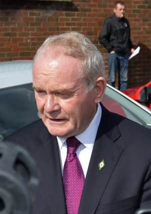 Martin McGuinness, Deputy First Minister speaking to the media outside the Model School Polling Station on Academy Road. DER1816GS055