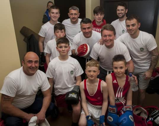 Some of the young boxers and their coaches who took part in Friday night's Odhran McKinney Memorial Boxing Tournament at the Maldron Hotel. The event was hosted by Oakleaf Boxing Club. DER1816MC002