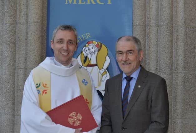 Mickey Harte (centre), the Tyrone senior inter-county team, who was a guest speaker at The Little Way Novena in St Eugenes Cathedral on Monday evening last, pictured with Fr. Paul Farren administrator at the cathedral.  DER1916GS027