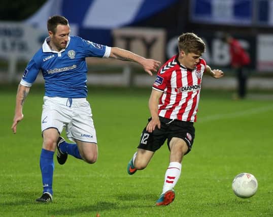 Former Derry City skipper, Barry Molloy closes down Derry City goalscorer, Joshua Daniels in the 2-2 draw with Finn Harps last Tuesday night.