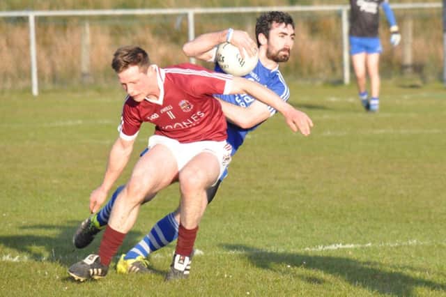 Claudy and Conor Johnston, i action against Salughtneil last week, face a crucial clash with Dungiven at O'Neill Park on Sunday.