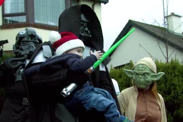 Jamie Harkin dressed as Darth Vader making little Ciaran's dream come true. Little Ciaran has only just turned two but was diagnosed with leukaemia last year. Jamie organised for The Emerald Garrison to go and visit little Ciaran through his charity 'Jamie's Journie'.