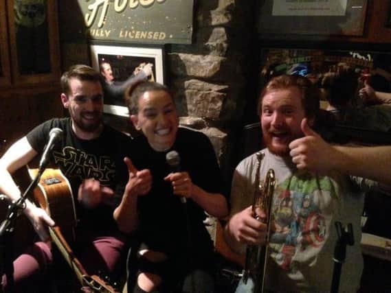 Thumbs up! Star Wars actress Daisy Ridley with members of the Tasty band, Niall McDonagh and John D Ruddy. (picture courtesy of John D. Ruddy)