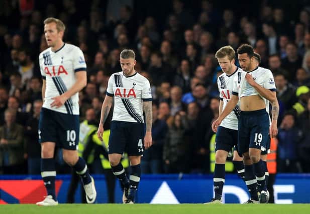 (From left to right) Tottenham Hotspur's Harry Kane, Toby Alderweireld, Eric Dier and Mousa Dembele look dejected after Chelsea's Gary Cahill scores his side's first goal during the Barclays Premier League match at Stamford Bridge.