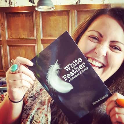 Clare Hegarty with her book.