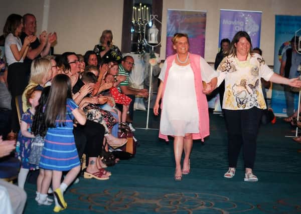 Angela McDonald with Ceara McElhinney at the Moving On Up fashion show. Photo: Peter McKane.