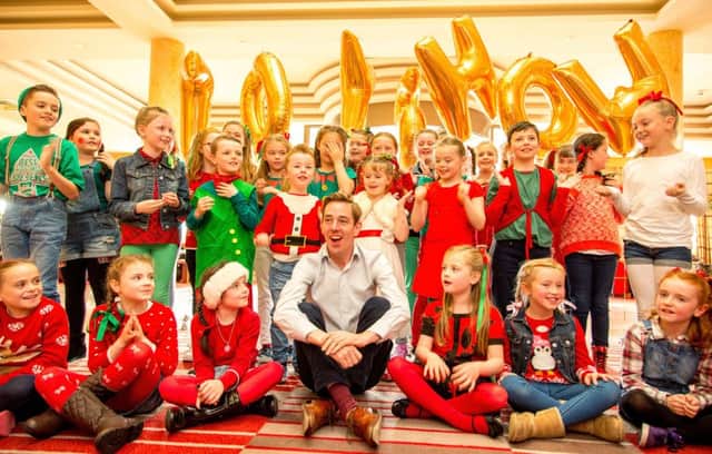RTE's Ryan Tubridy pictured previously with The Blue Ribbon Choir from Donegal as they auditioned for The Late Late Toyshow. (Photo: James Connolly)