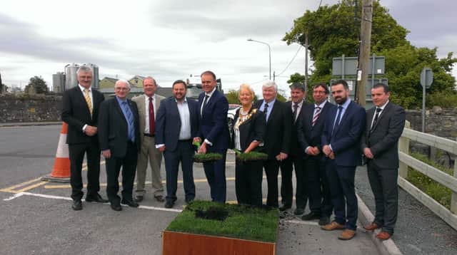 Minister Joe McHugh TD pictured with Inishowen Mayor Rena Donaghey, Senator Padraig MacLochlainn, local politicians and others involved in the bridge project.