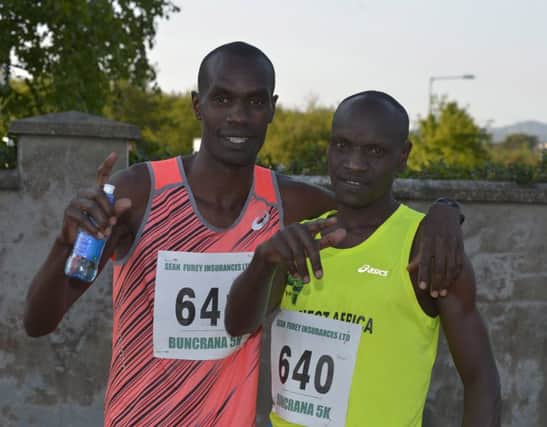 Kenyan Dan Tanui (right) winner of the 13th annual Buncrana 5k on Wednesday evening last with his fellow countryman Eric Koech who took second place.  DER2116GS011