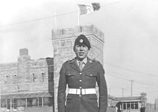 Robert McGuinness pictured outside Renmore army barracks, County Galway, aged 18.