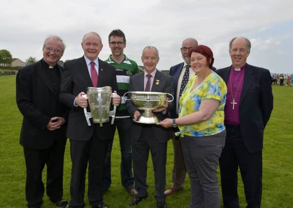 Pictured at the official unveiling of the Na Magha clubhouse at Ballyarnett  on Saturday afternoon last are (L-R) The Most Reverend Donal McKeown Bishop of Derry, deputy First Minister Martin McGuinness , Dr Feargal McNicholl,  Michael Hasson President of the Ulster Council GAA, Brian Smith,  Catherine Neary and The Right Reverend Bishop Good CoI, DER2216GS061