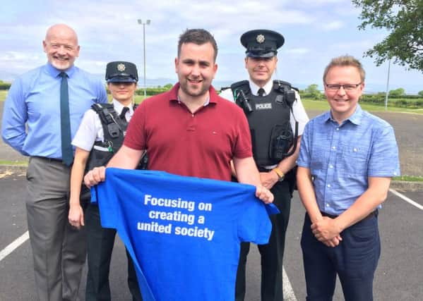 L-R: Alan Young, Service Delivery Manager, Translink; PSNI Cons. McCann, Columba Mailey, Vale Centre; PSNI Sgt Robert Ennis; Johnny Donaghy, Good Relations Officer, Causeway Coast and Glens Council.
