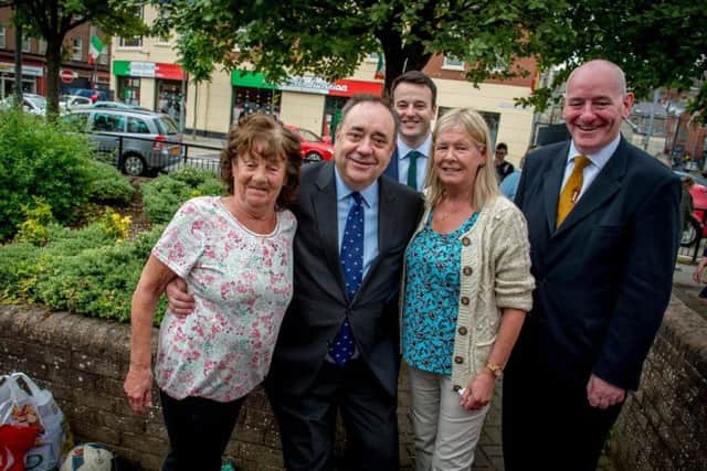 Former First Minister of Scotland, Alex Salmond MP, met some local voters during his visit to the city on Friday. Included is SDLP Leader Colum Eastwood MLA and Mark Durkan MP.